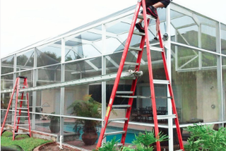 removal of a screen pool enclosure with ladders